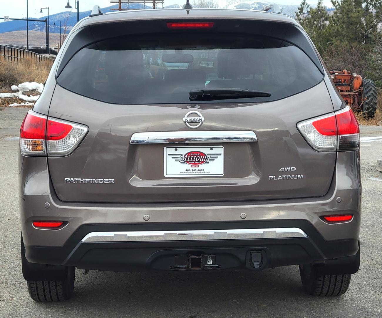 2013 Brown /Tan Nissan Pathfinder Platinum (5N1AR2MM1DC) with an 3.5L V6 engine, Automatic / CVT transmission, located at 450 N Russell, Missoula, MT, 59801, (406) 543-6600, 46.874496, -114.017433 - 4 Wheel Drive SUV. Power Sunroof. 3rd Row Seating. Heated Leather Front and Middle Seats. Power Front Seats. DVD Screens in Headrests. Navigation. Bluetooth. Backup Camera. AM FM CD DVD XM. Heated Steering Wheel. Towing. - Photo#7